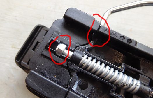 The other part of the process is to wriggle and otherwise convince the nut (circled in red) to nest in its slot. The other part of the process is to wriggle and otherwise convince the nut (circled in red) to nest in its slot.