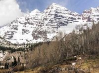 From Maroon Lake, the face drops down—right side of the frame above—through tiers of cliffs that seemingly guard any possibility of sane ski…but there is a line and it goes. From Maroon Lake, the face drops down—right side of the frame above—through tiers of cliffs that seemingly guard any possibility of sane ski…but there is a line and it goes.