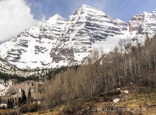 From Maroon Lake, the face drops down—right side of the frame above—through tiers of cliffs that seemingly guard any possibility of sane ski…but there is a line and it goes. From Maroon Lake, the face drops down—right side of the frame above—through tiers of cliffs that seemingly guard any possibility of sane ski…but there is a line and it goes.