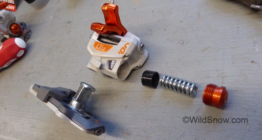 First, the binding heel housing is removed from the center turret. First, the binding heel housing is removed from the center turret.