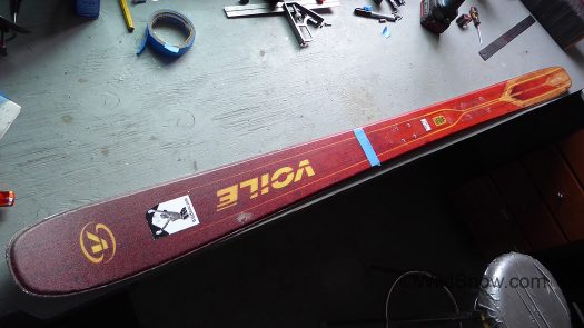 To draw a nice 'square' line across the ski, use edge of workbench, with tail of ski offset about a centimeter from the edge. To draw a nice 'square' line across the ski, use edge of workbench, with tail of ski offset about a centimeter from the edge.