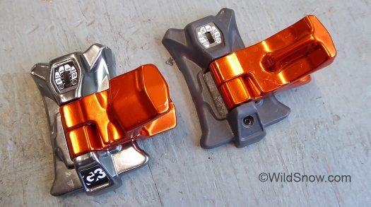 Tops removed from heel units, earlier solid aluminum to left, co-molded steel-plastic to right. Tops removed from heel units, earlier solid aluminum to left, co-molded steel-plastic to right.