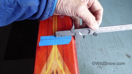 Using modified caliper to find ski center, just approximate, switch sides and make marks, you can usually narrow it down in two steps. Using modified caliper to find ski center, just approximate, switch sides and make marks, you can usually narrow it down in two steps.