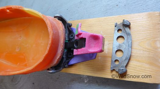 1980s boot toe with early Dynafit binding, fitting extracted from that era boot displayed to right. 1980s boot toe with early Dynafit binding, fitting extracted from that era boot displayed to right.