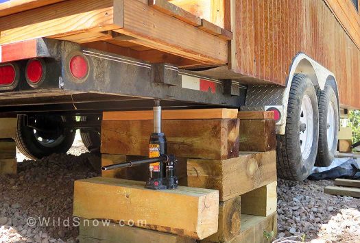 Bottle jack on temporary pad, crisscross cribbing is temp as well, only less so. Bottle jack on temporary pad, crisscross cribbing is temp as well, only less so.
