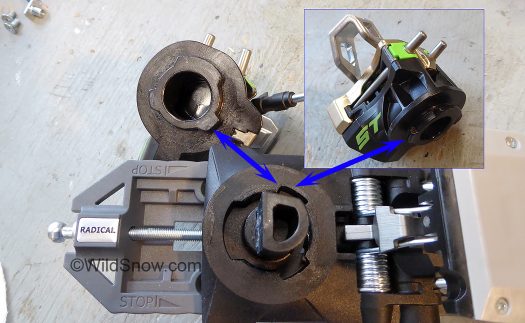 Rear binding housing (at top of photo), has obvious flanges corresponding to slots and flanges in the base. Rear binding housing (at top of photo), has obvious flanges corresponding to slots and flanges in the base.