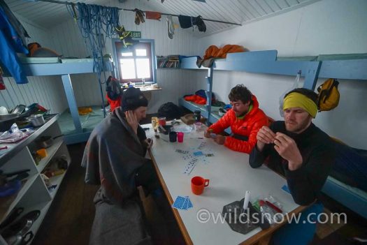 Settling in to a day at the Tas Saddle Hut while the winds roared outside.