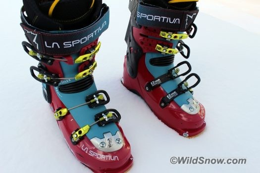 Snap in the green "Pegasus" when you put on the boots. Clamp the black levers down for skiing; up for touring. 