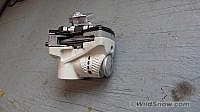 Spring barrel cap is the silver colored metal part to the right of the visible release setting numbers. Spring barrel cap is the silver colored metal part to the right of the visible release setting numbers.
