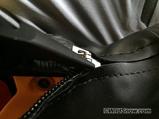 Use the needle nose pliers of the Leatherman to clamp the zipper's slider to its original position. Use the other boot to gauge how easily the zipper should slide. Use the needle nose pliers of the Leatherman to clamp the zipper's slider to its original position. Use the other boot to gauge how easily the zipper should slide.