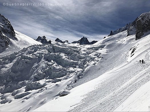 The icefall makes the skiers look pretty small. One of the most impressive things about the Vallée Blanche is the humbling but exhilarating experience of feeling rather frail and puny next to the dramatic mountains. Photo credit Sue Shepler. The icefall makes the skiers look pretty small. One of the most impressive things about the Vallée Blanche is the humbling but exhilarating experience of feeling rather frail and puny next to the dramatic mountains. Photo credit Sue Shepler.