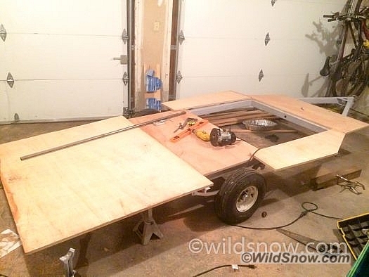 2017-02-22 20.37.54 The floor is essentially the only part of this trailer that is susceptible to water damage (it's the only major wood component). To mitigate the risk I used nice 3/4 in marine grade plywood that is painted with several coats of thinned polyurethane. I also painted the bottom with nice exterior paint, and glued the whole thing to the trailer frame with construction adhesive (it's also held on with bolts). After the trailer exterior is finished I'll spray some undercoating underneath as another layer of protection.