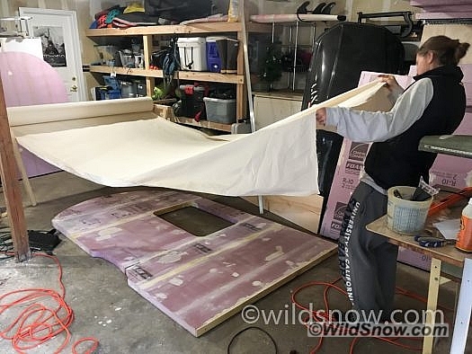 2017-11-12 11.25.01 After the wall is glued, we filled in any divots and sanded it smooth, before coating it with the canvas and glue PMF.