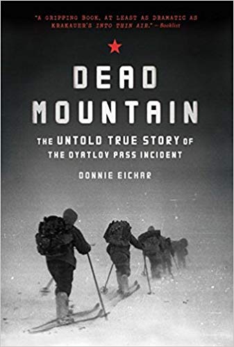 The foreboding cover features one of the last photos taken of the skiers before the fatal incident