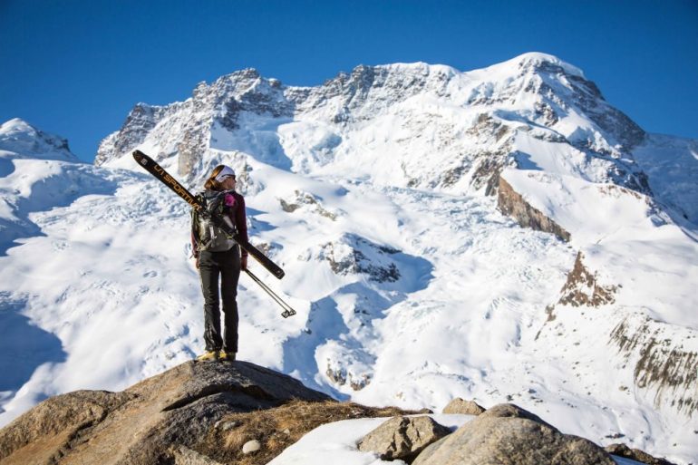 Skinny skis in big peaks: Janelle takes in the view outside of Zermatt.