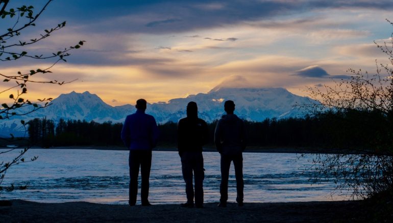 Eyeing up the objective. Cal, Gary, and Drew at the confluence of the Talkeetna and Susitna rivers the evening prior to departure. Photo @bigmountaincreative