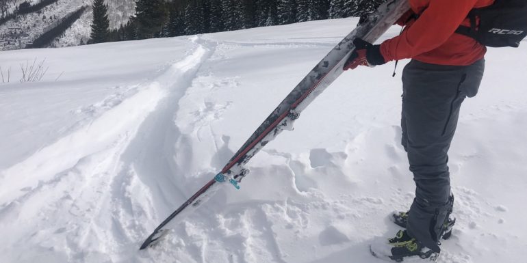 Solo ski strap for the win. It doesnt look great but it got us where we needed to go.