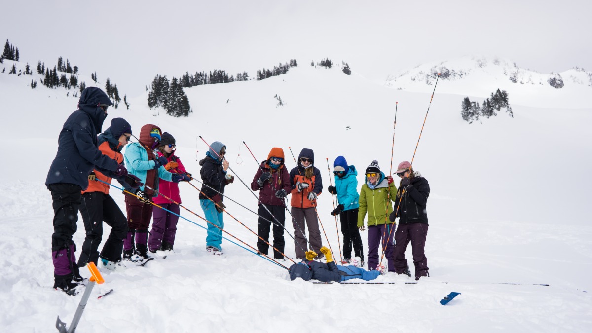 Student learning how to use their probe in an AIARE Level 1 course at Mountain Rainier