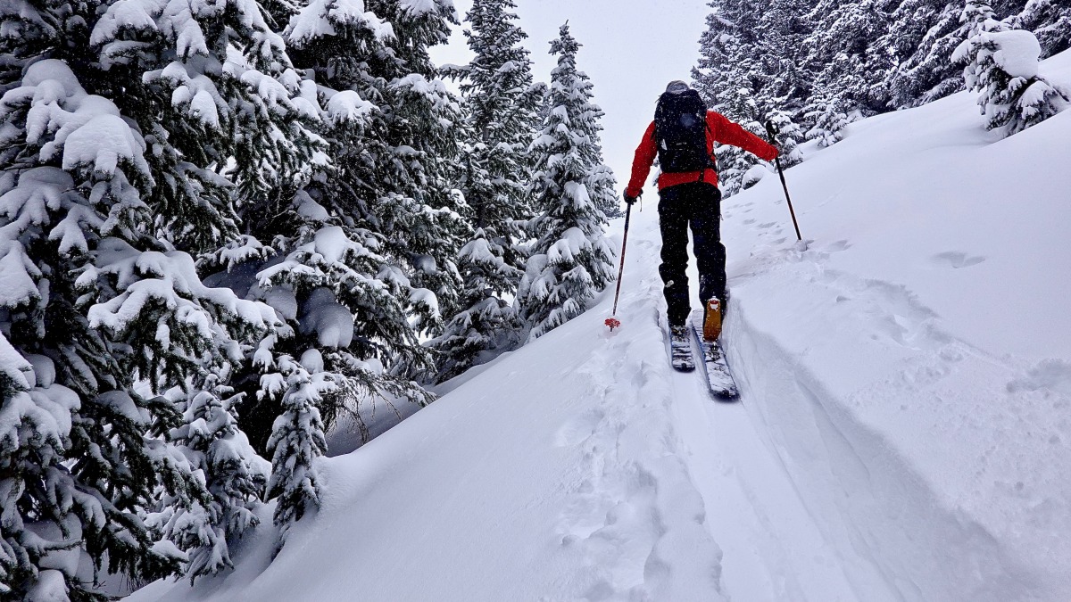 Gliding up our recycled trench on the 104s for more snow in the face, somewhere around lap 3