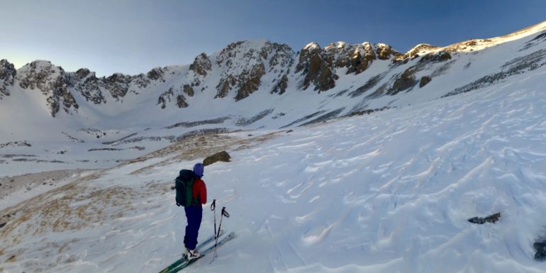 Sam gazes at the ridge chutes adjacent to Mount Mahler.