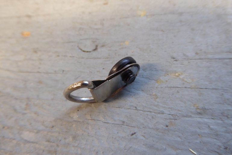 D-ring with chicago-screw, male side, ready to install. Don't forget a drop of thread locker.