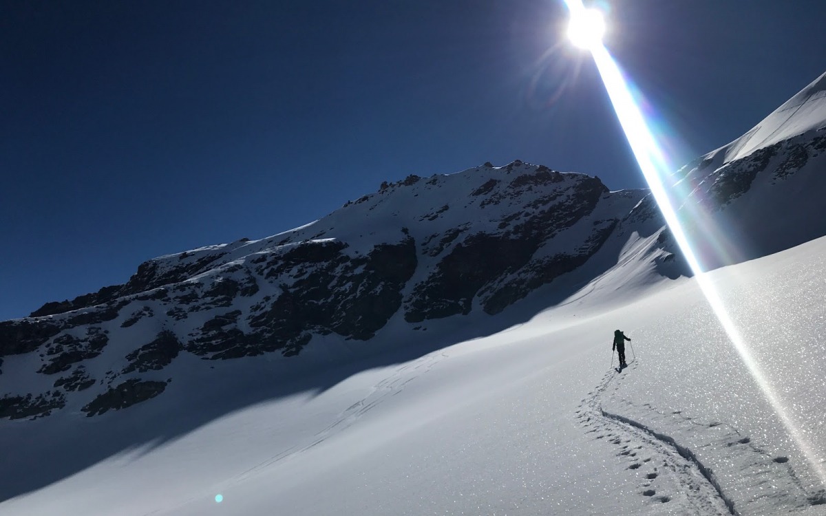 Sheamus Croke is on some delicious low angle powder, but the connecting slope above significantly steepens, exposing him to avalanche hazard above. The backcountry holds a lifetime's worth of powder turns. Being smart with how to access such blissful turns is the crux of the matter.