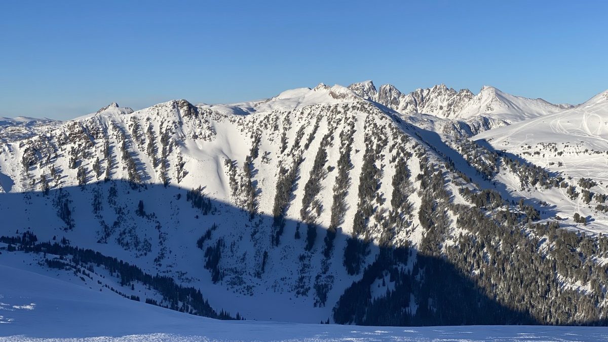 A few days later, once the skies cleared, I snapped a shot of the lines we skied on day three, pictured in the previous photo. We skied the four chutes, starting from the right of the photo. We heard the locals call these “Rasta Chutes” coming down from Scotch Bonnet mountain.