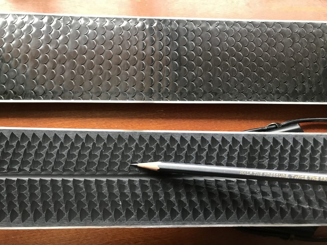 The Fischer climbing pattern is almost the opposite of the Voile pattern. The fan shape of the Fischer pattern relies on the snow packing into a broad arch rather than the narrow, concentrated point of the Voile pattern. Hopefully the narrower pattern of the Voiles will translate into a significant improvement in climbing performance.