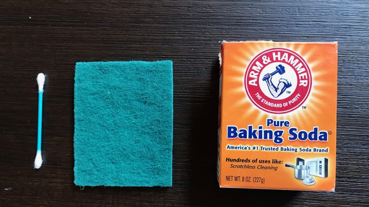 Corrosion can be cleaned up with baking soda, water and a scrubby. You could also try vinegar and a q-tip. Regardless of the method, wear protective gloves.