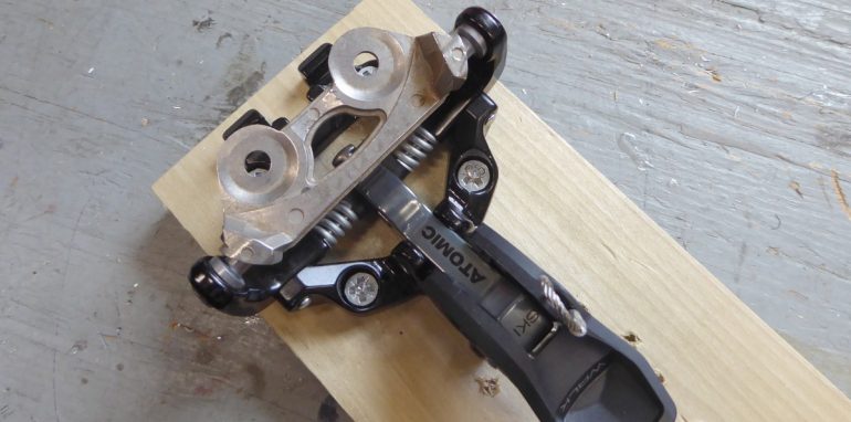 Step 132: Use a boot or a boot fitting to hold the binding in the on-boot position.