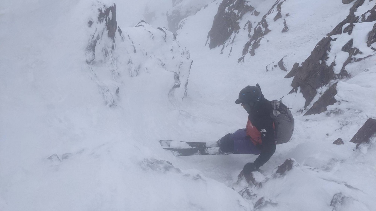 The crux choke was just above a ‘sluff-pow’ filled apron. The choke was icy, but luckily required no rappels. On the apron, we popped below the cloud layer. It felt like transporting back to reality after an otherworldly descent…