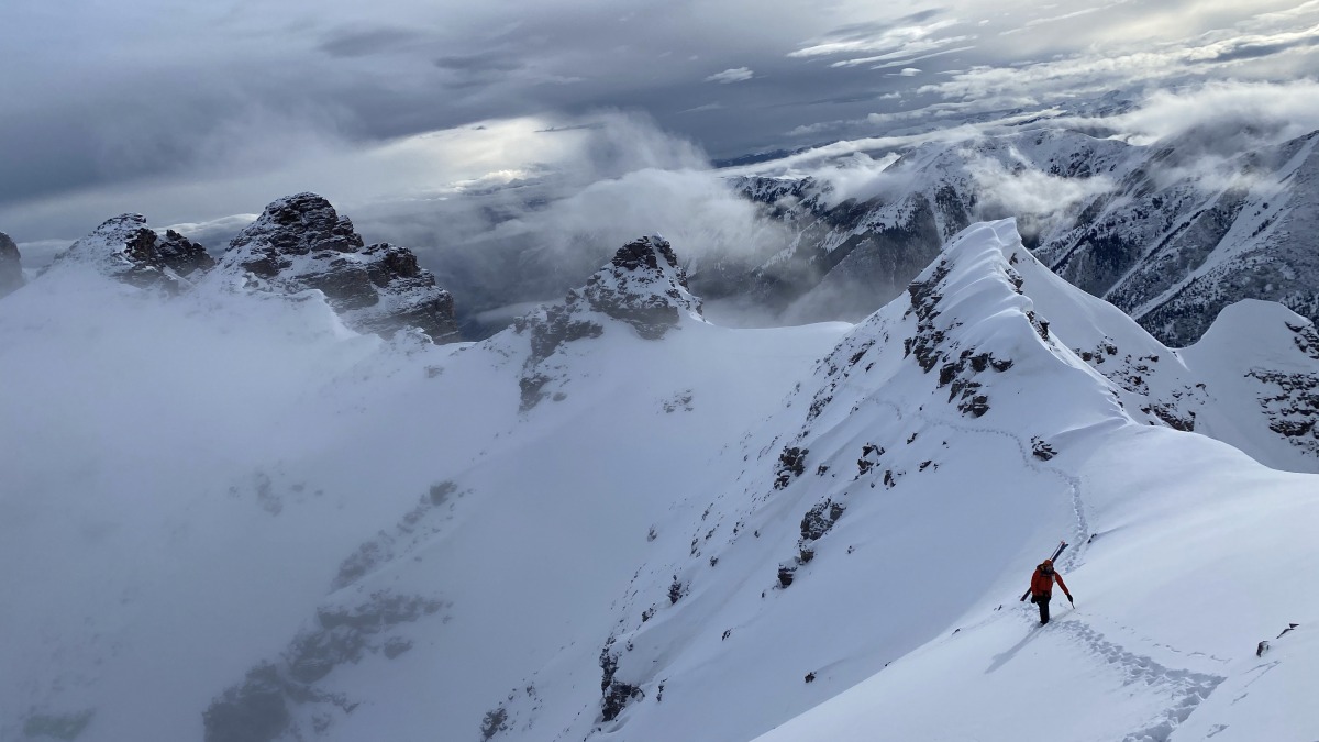 Here’s Aidan climbing the summit snow ridge. We were above a sea of clouds tangled up in valleys below. It was quite nice.