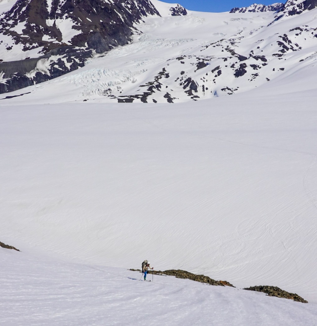 Looking back across the Eagle- the route down from the White Out Glacier starts in the middle of the glacier across the valley, angling onto the large moraine to skier's left.
