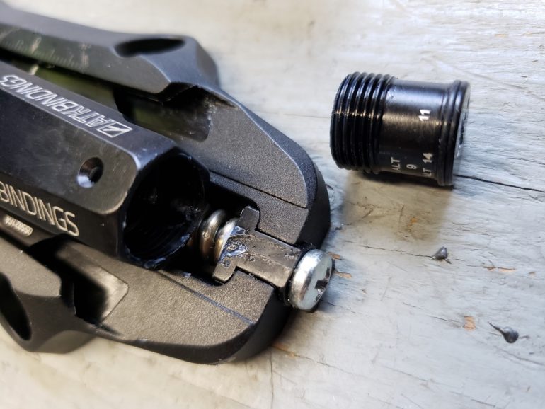 I backed out the torsional release spring barrel.