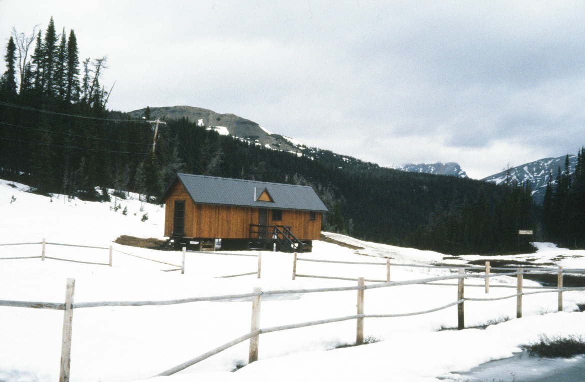 Our snow lab at Sunshine Ski Area. We moved snow samples from the corralled Warden's snowplot into a cold room on the left side of the lab. Glaciology technician Terry Beck did the lion's share of general contracting to build the lab as well the weather station at the top the Great Divide ski lift (Ron Perla photo, June 1978.)
